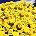 Yellow floating mahjong tiles