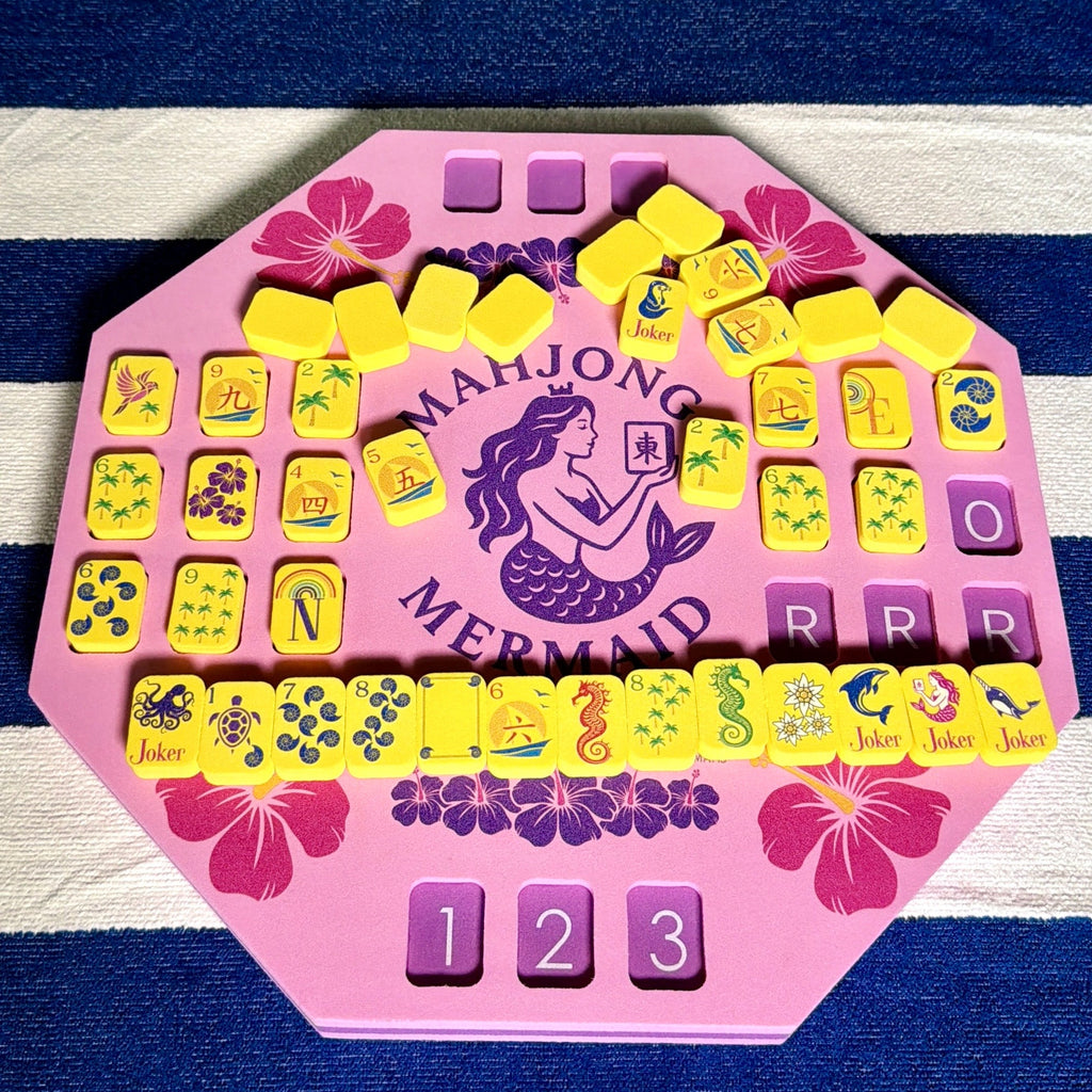 Pink floating solo mahjong mat, yellow floating mahjong tiles