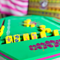 Green floating mahjong mat spa size with yellow floating tiles