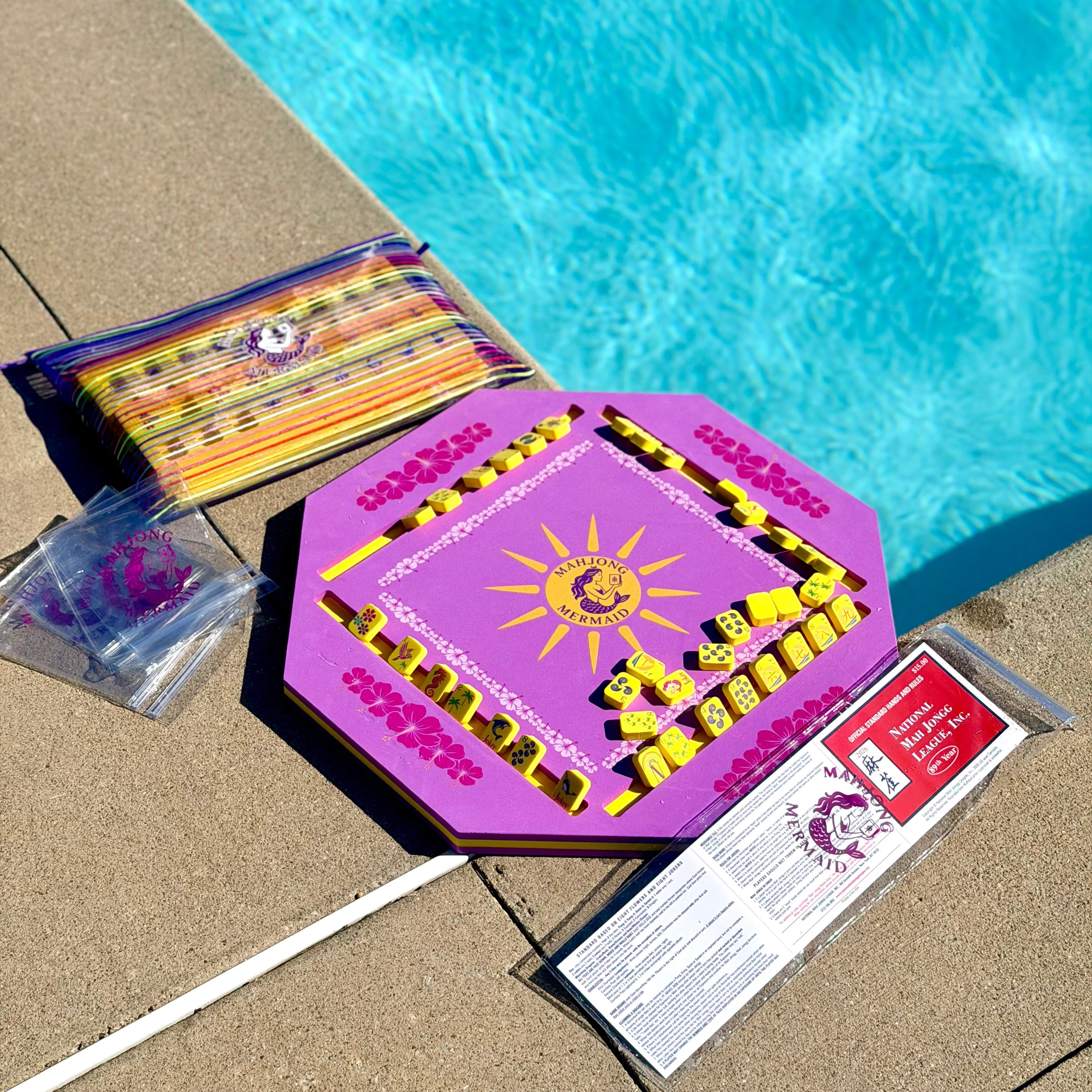 Purple floating mahjong mat, yellow floating mahjong tiles with colorful striped mesh tile bag, waterproof mahjong card protectors