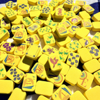 yellow floating mahjong tiles