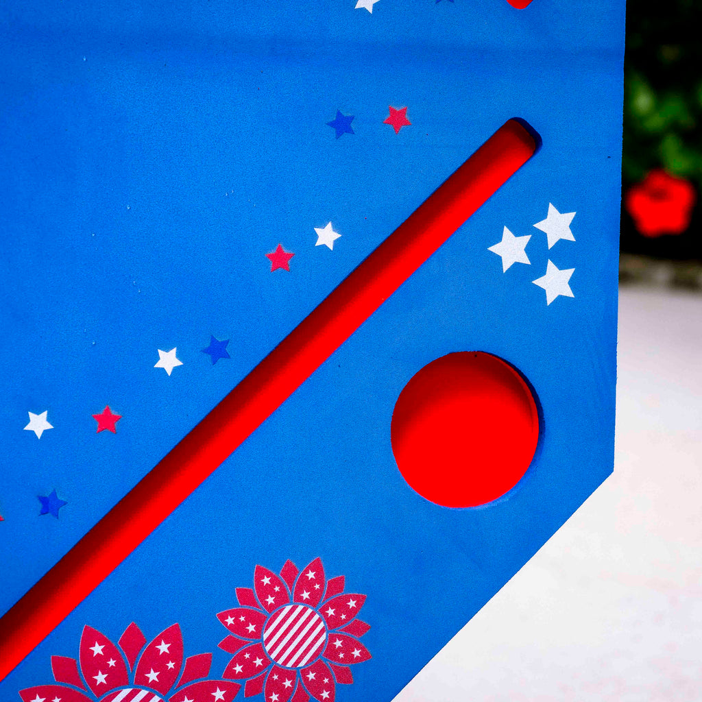 red, white, and blue floating mahjong mat showing rack and cupholder