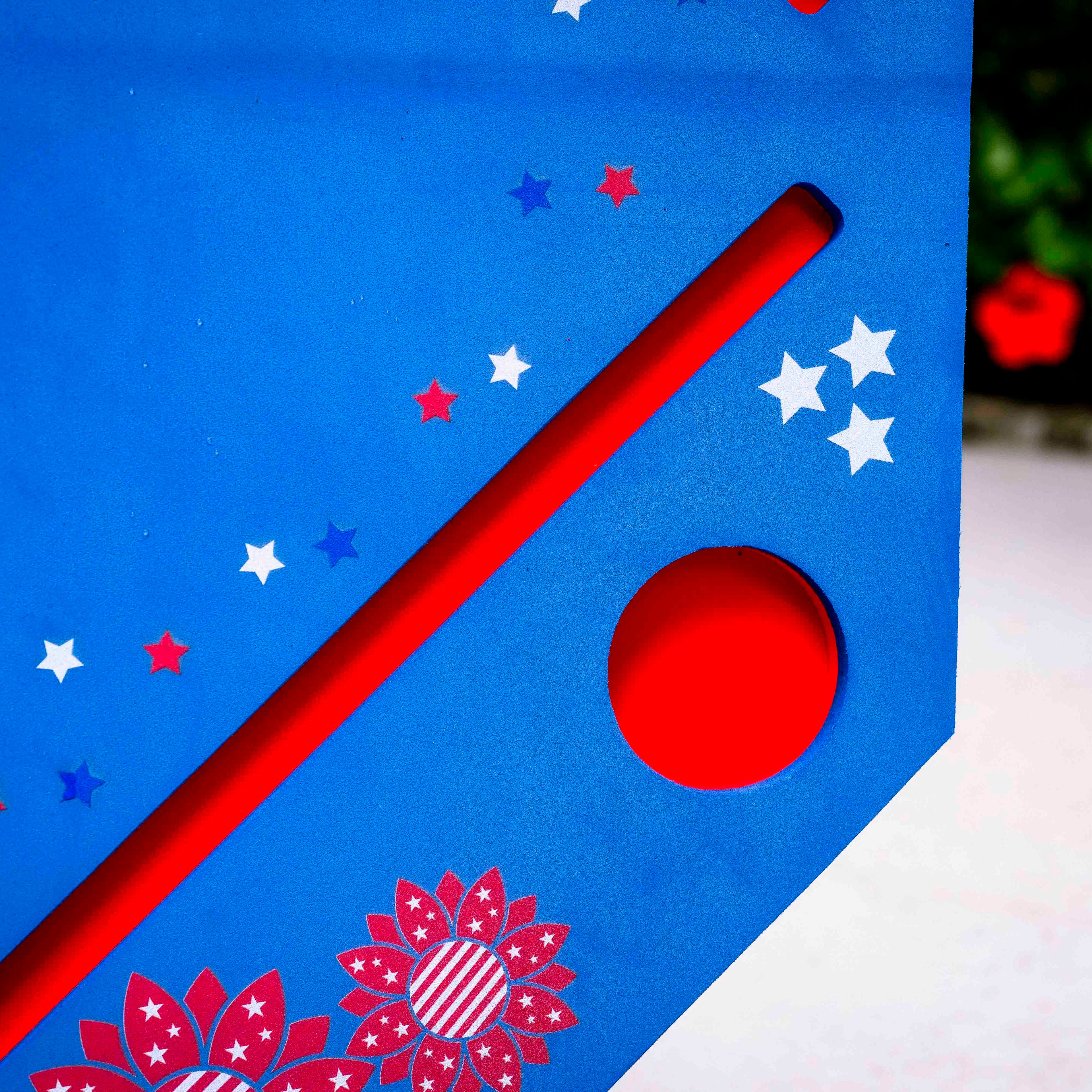 red, white, and blue floating mahjong mat showing rack and cupholder